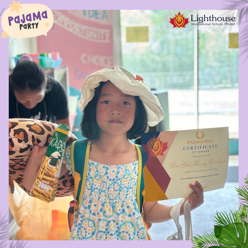 little girl holding her certificates