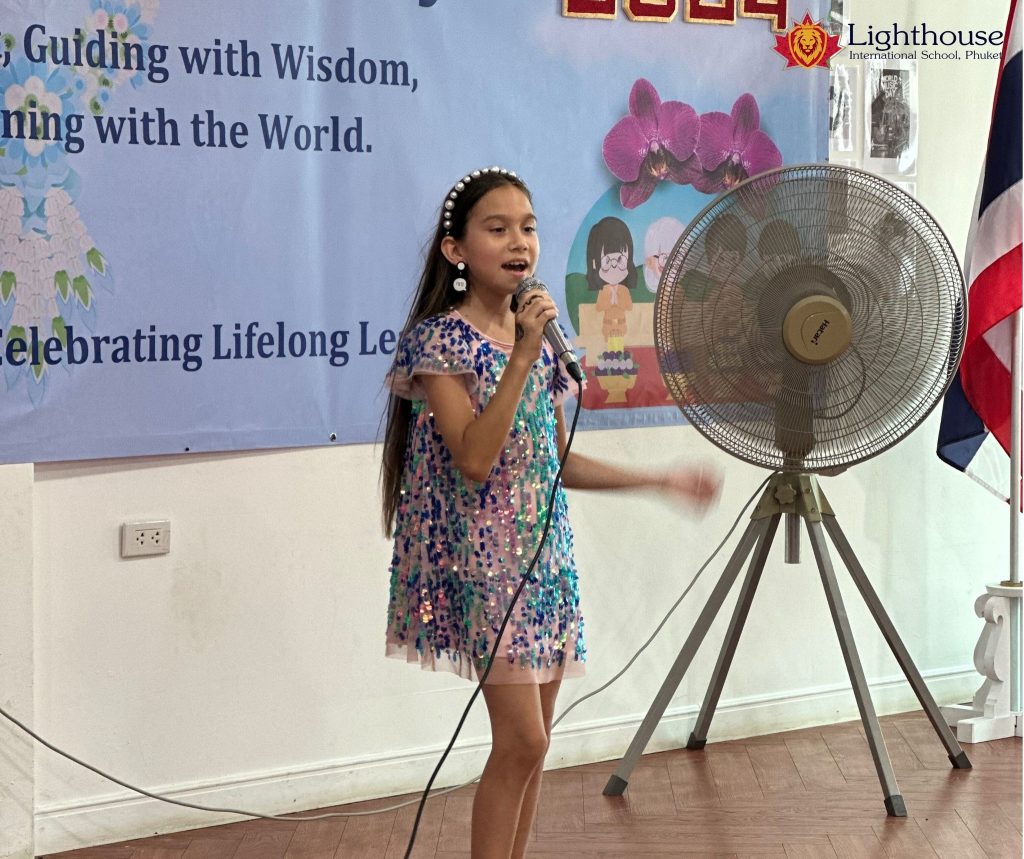 Girl in a sparkly dress, performing a song