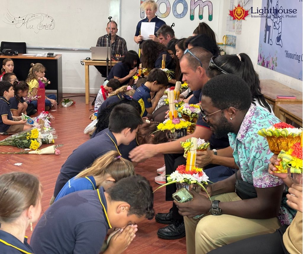 Students offering flowers to their teachers