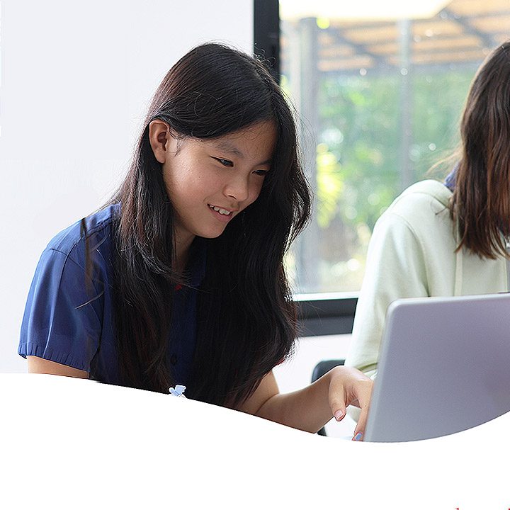 scholarships showing female student with laptop