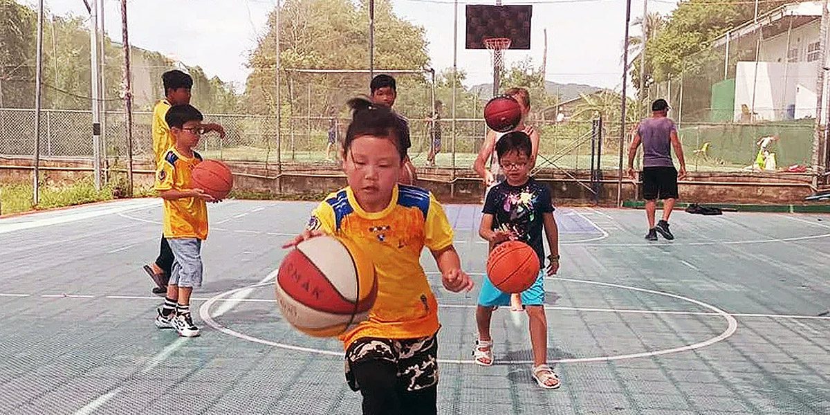 highlights-lighthouse-primary-school-artficial-covered-courts Primary students from Lighthouse International School practicing their hoops