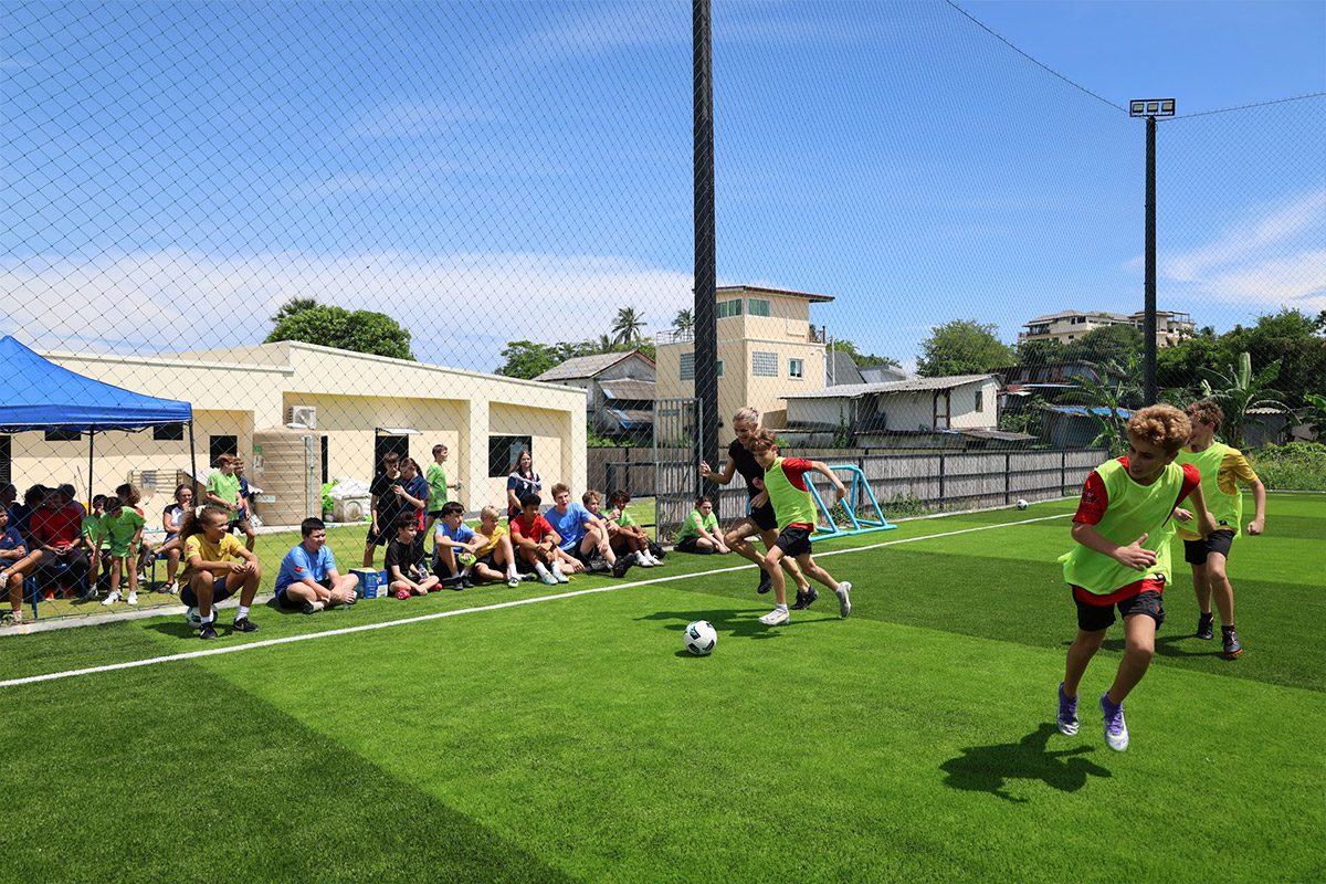 investment in football pitch students playing