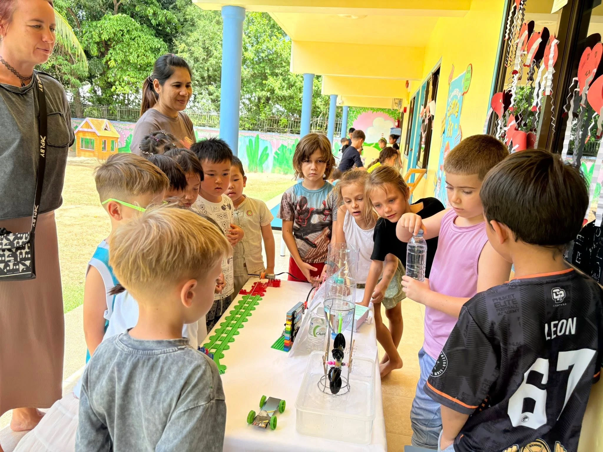 Primary students performing a science activity