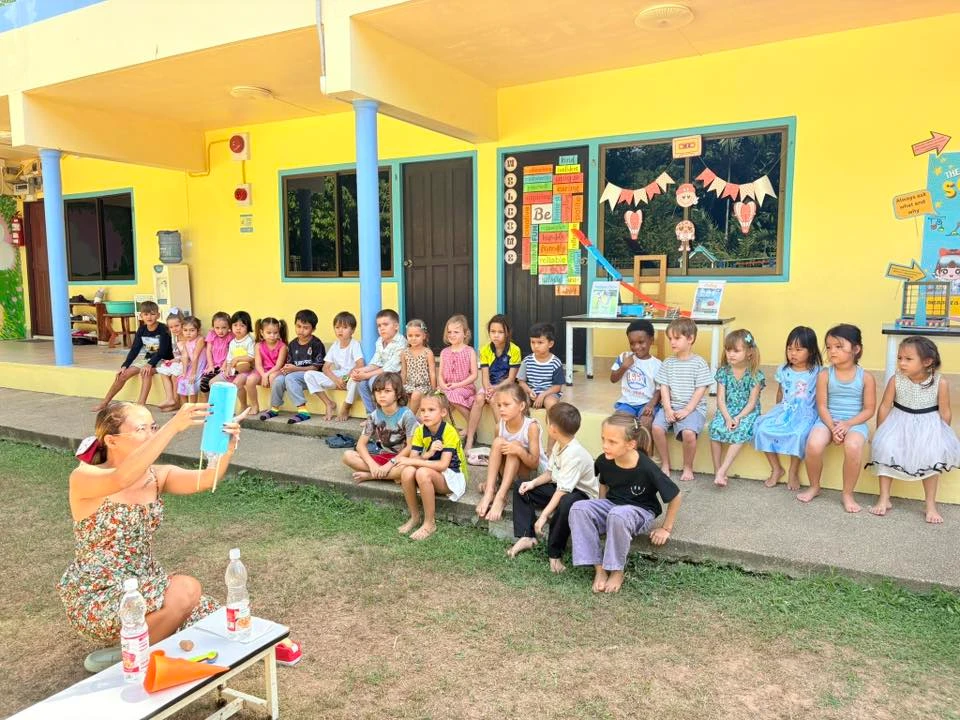 Teacher performing a science activity