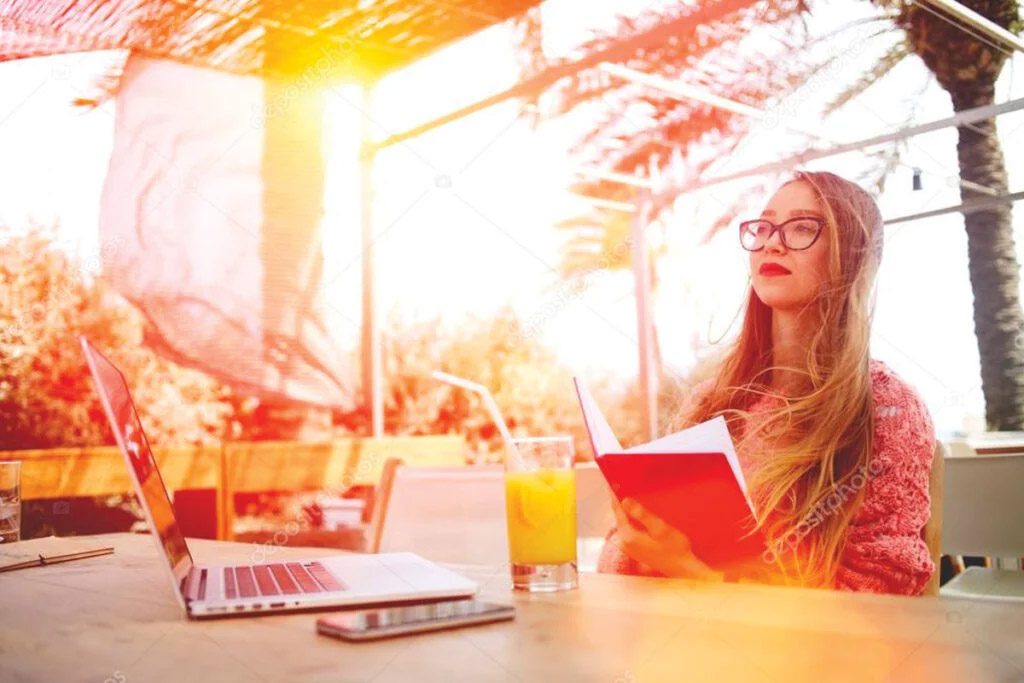 modern workplace freelance girl with laptop nomad
