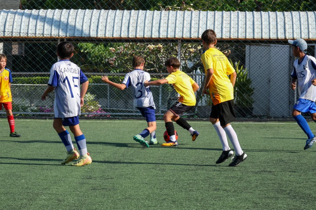 Students in football field match