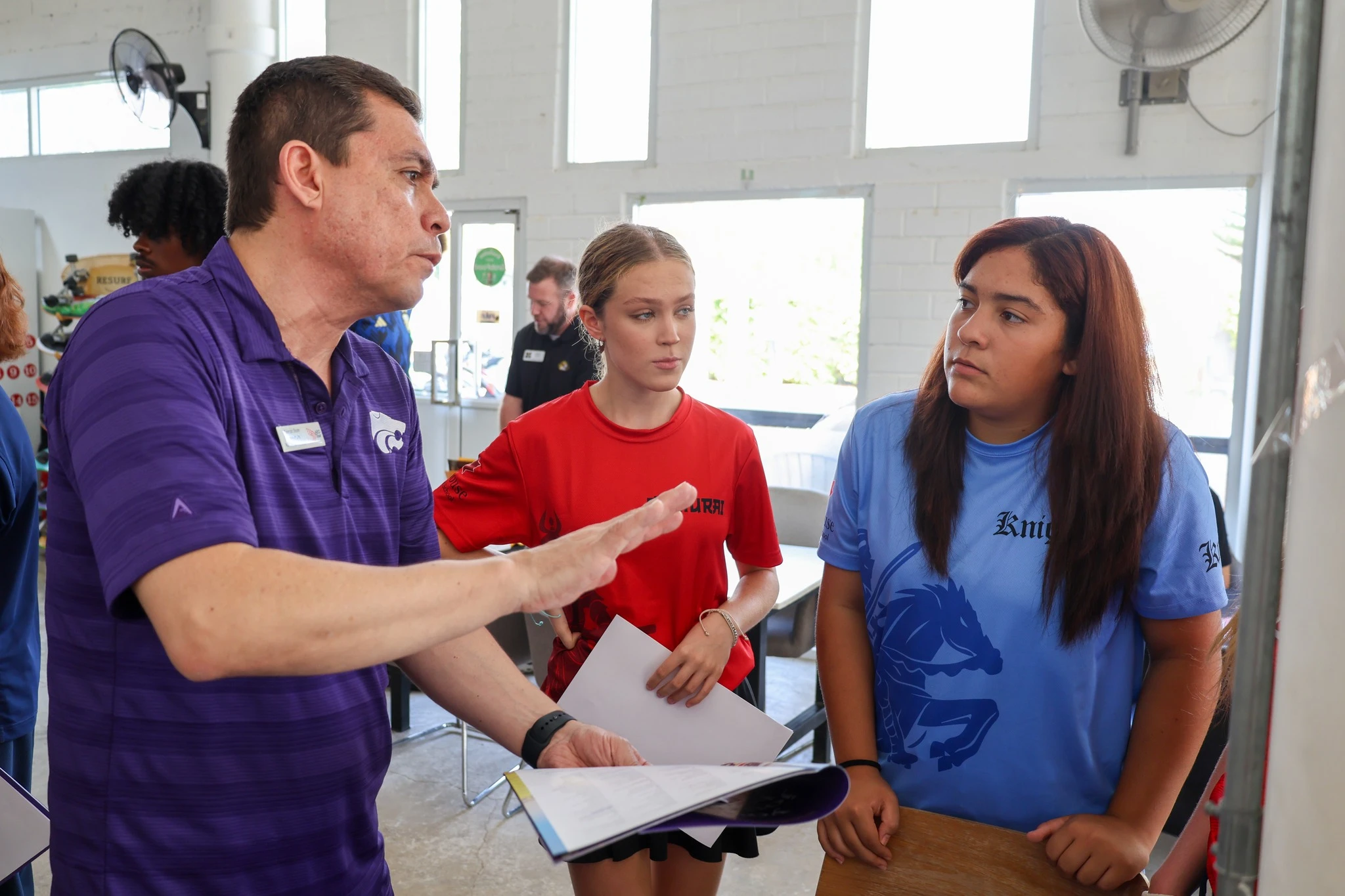 Teacher talking about university options to students