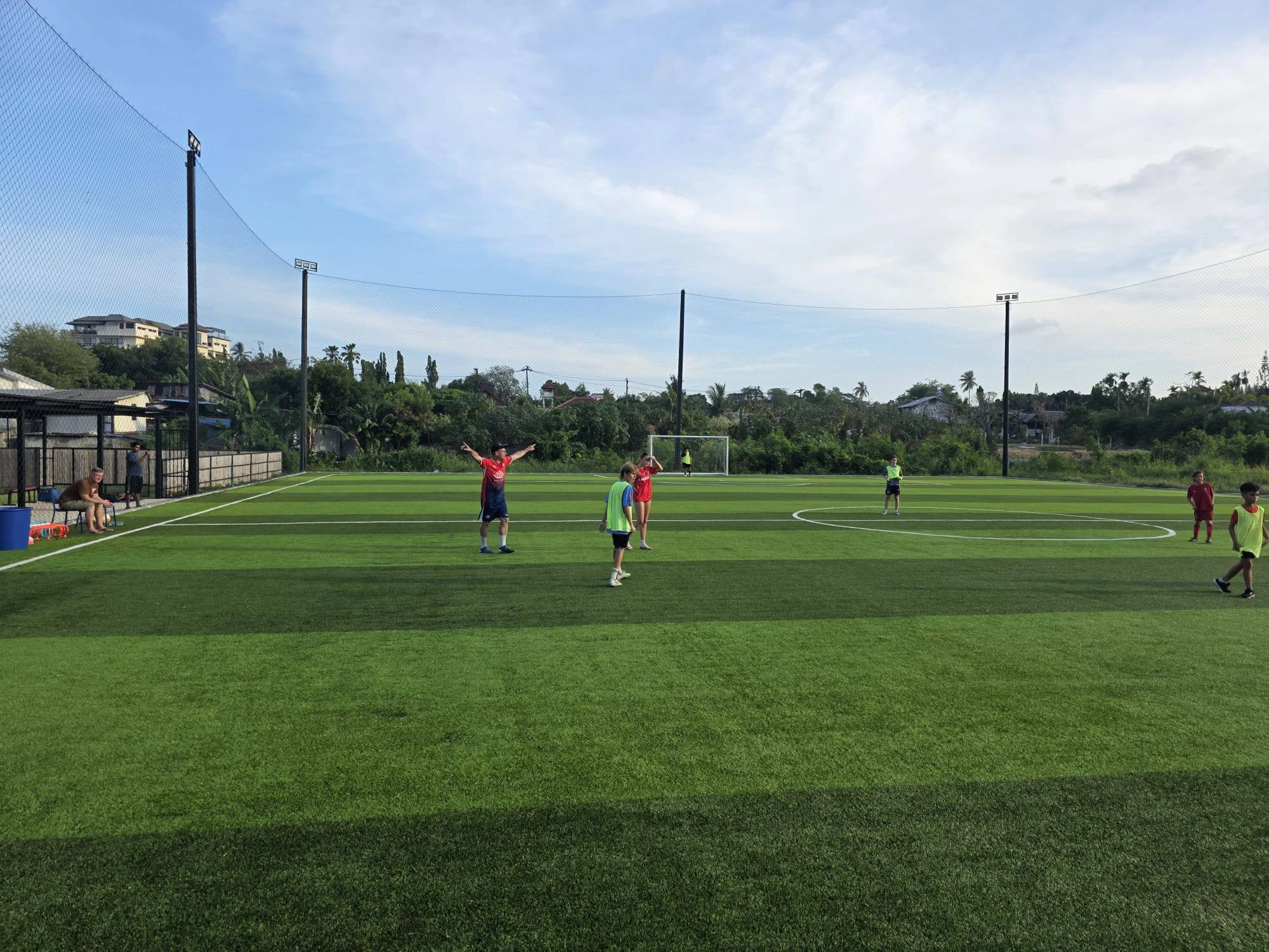 Coach with kids football