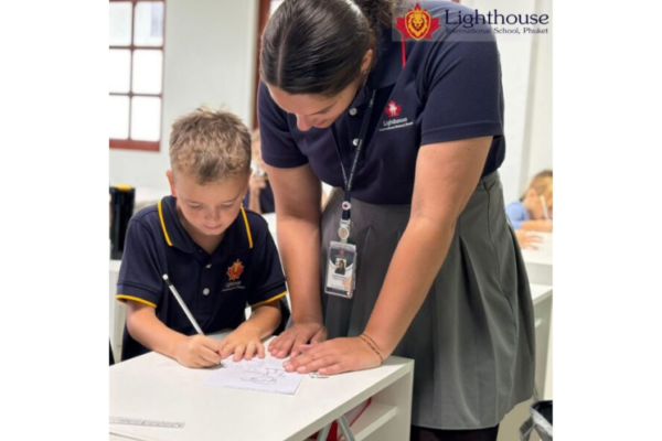 Teacher helping a student