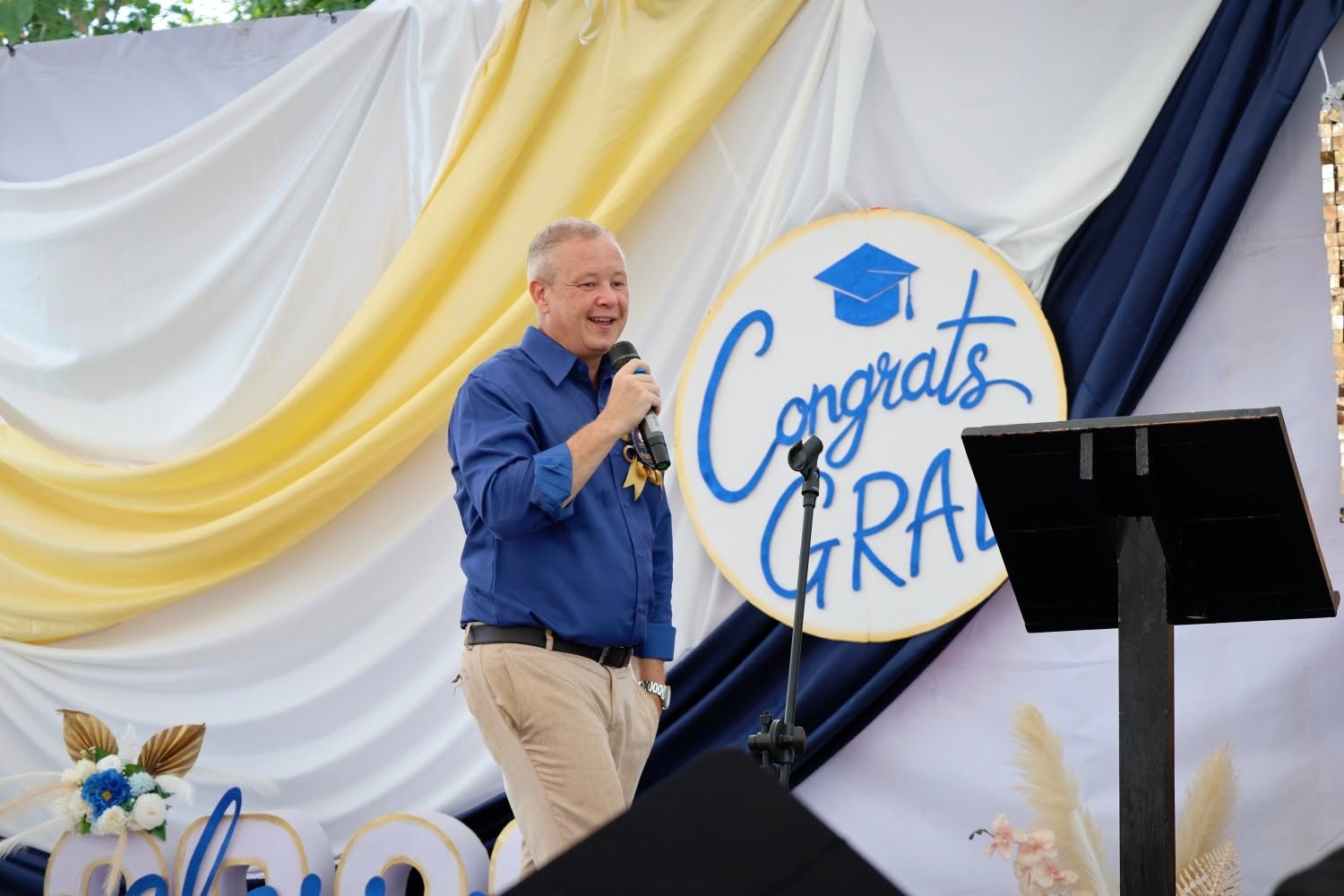 Dan Skitch giving a speech during the Grade 6 graduation at Lighthouse International School