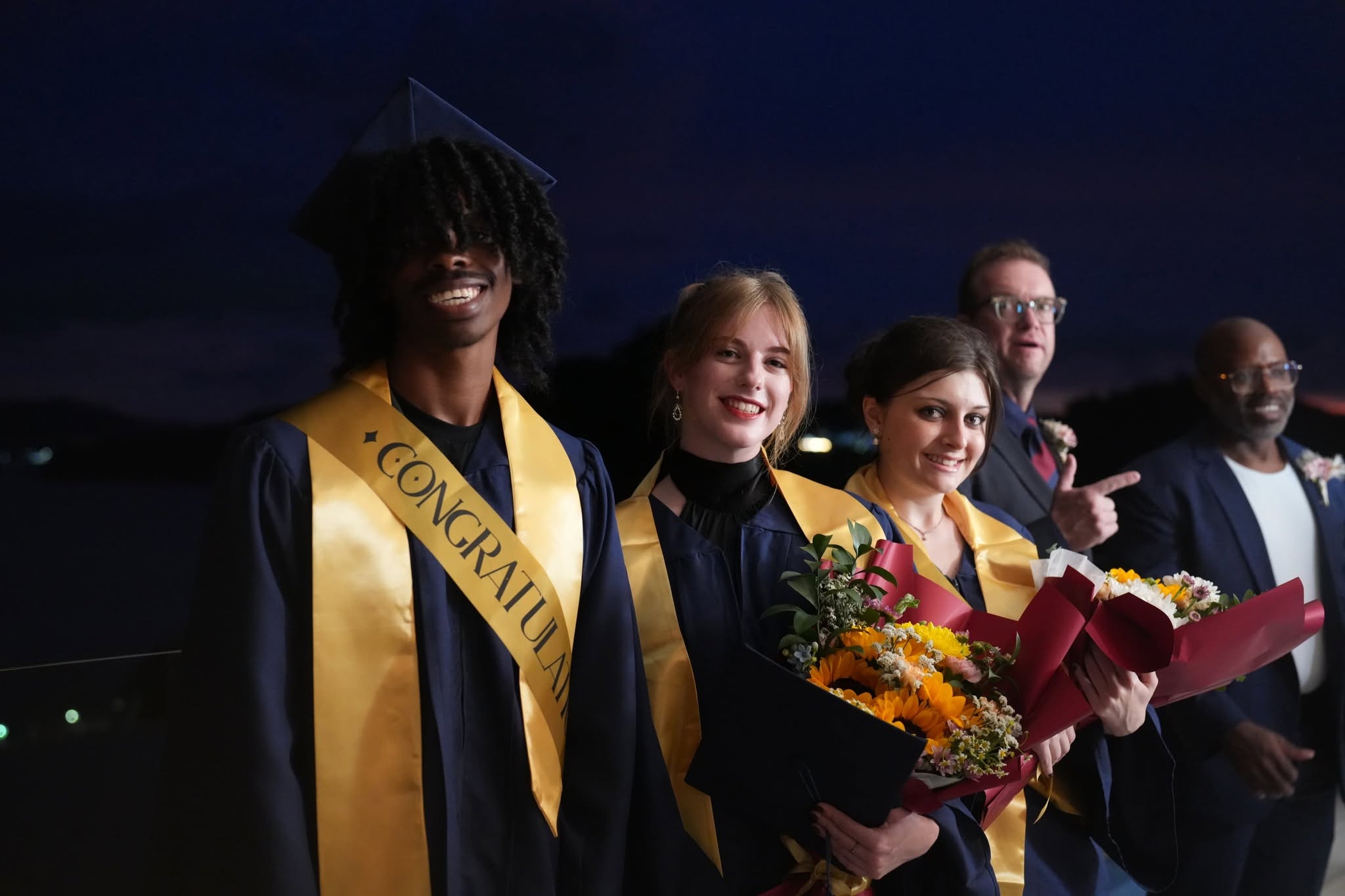 Graduating students with their teachers