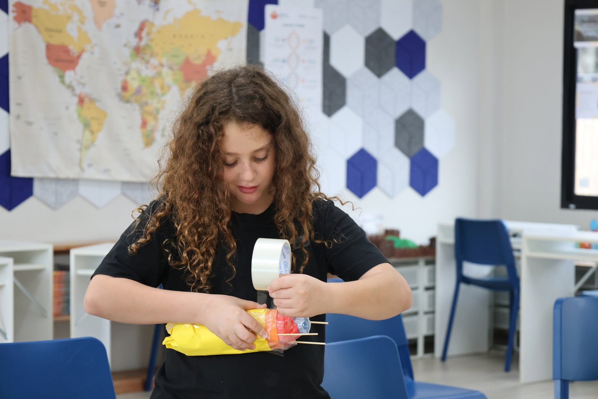 Lighthouse student creating rocket from plastic bottles Lighthouse student creating rocket from plastic bottles