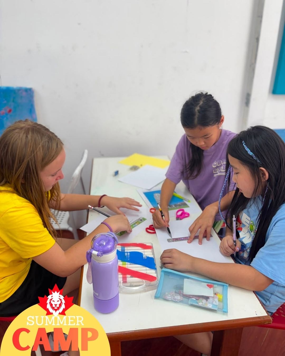 Three girls working together on an activity during Primary Summer Camp at Lighthouse International School