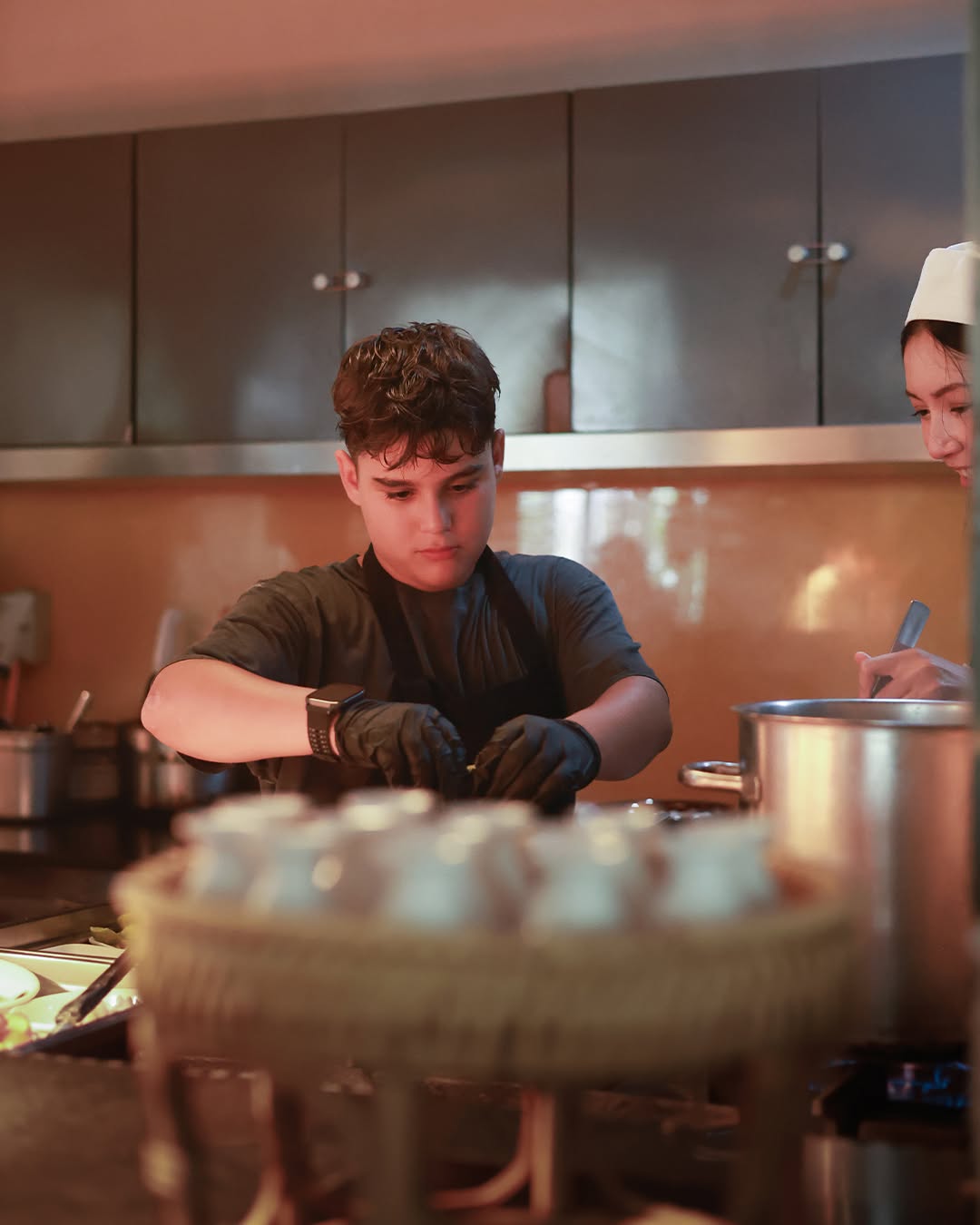 Boy focused on cooking lessons - Lighthouse masterchef Boy focused on cooking lessons - Lighthouse masterchef