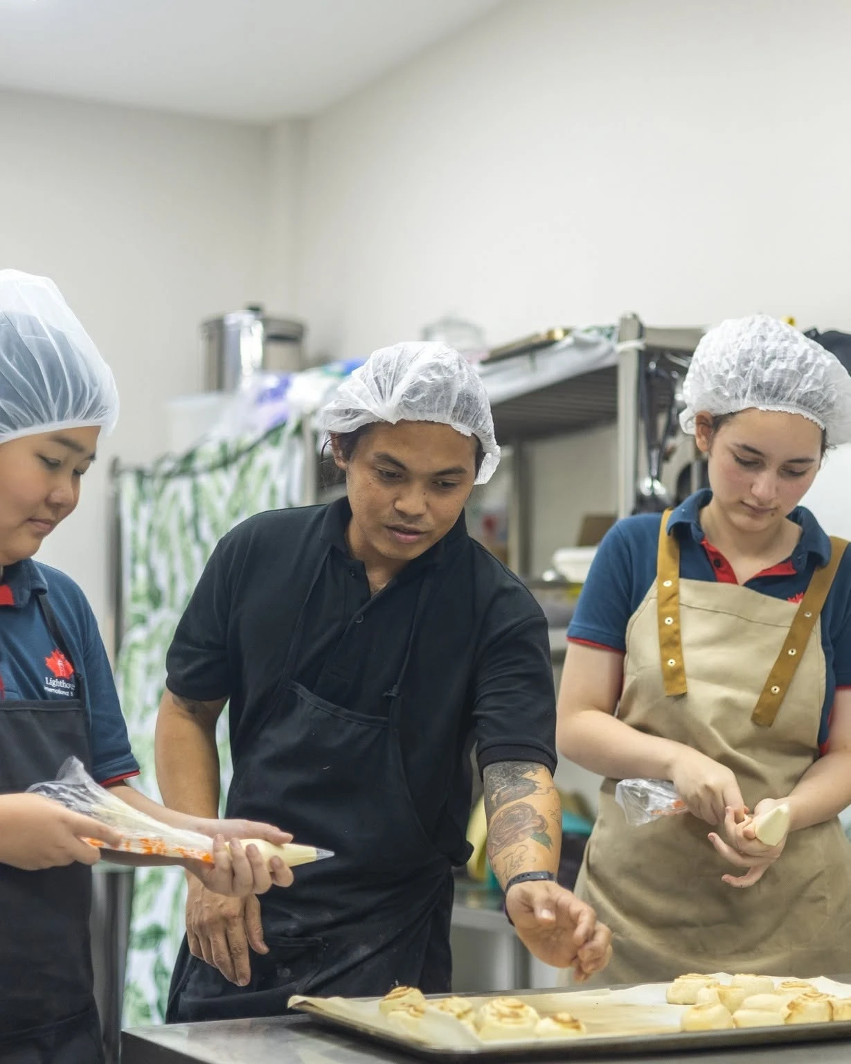 Lighthouse International School students baking - ECA
