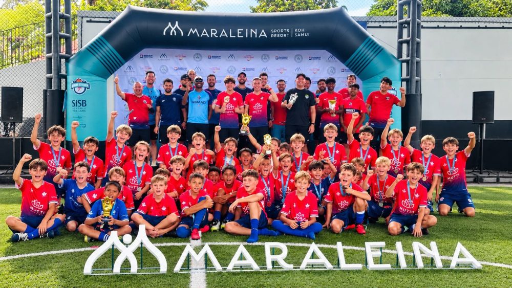Lighthouse Lions U10 Koh Samui football players with coach