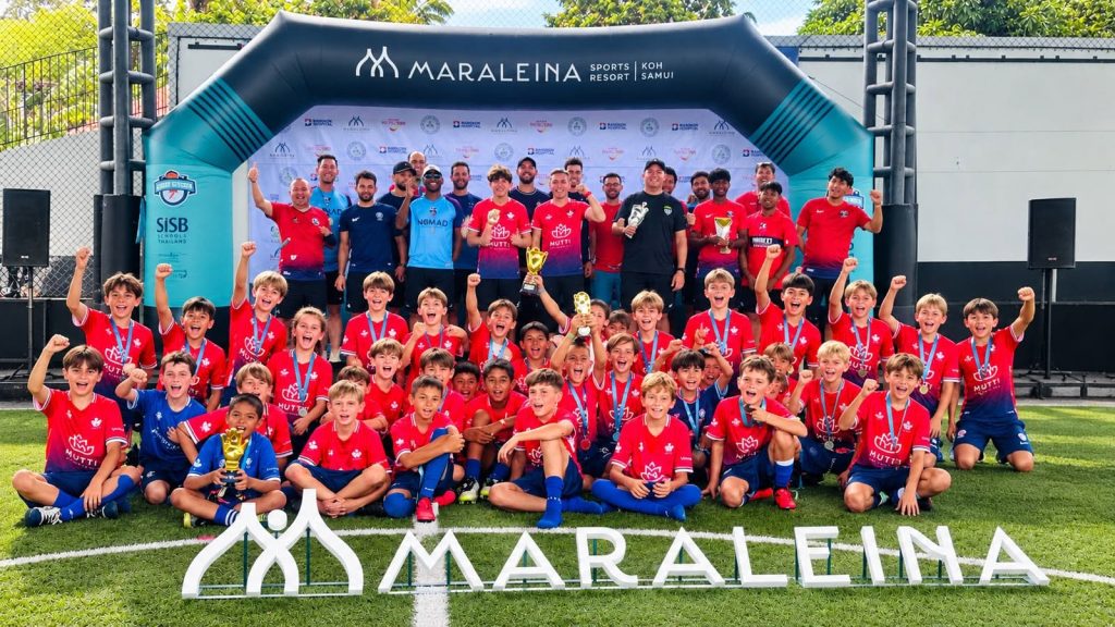 Lighthouse Lions U10 Koh Samui football players with coach
