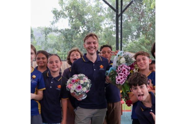 Lighthouse teacher beaming with students for Wai Kru Day